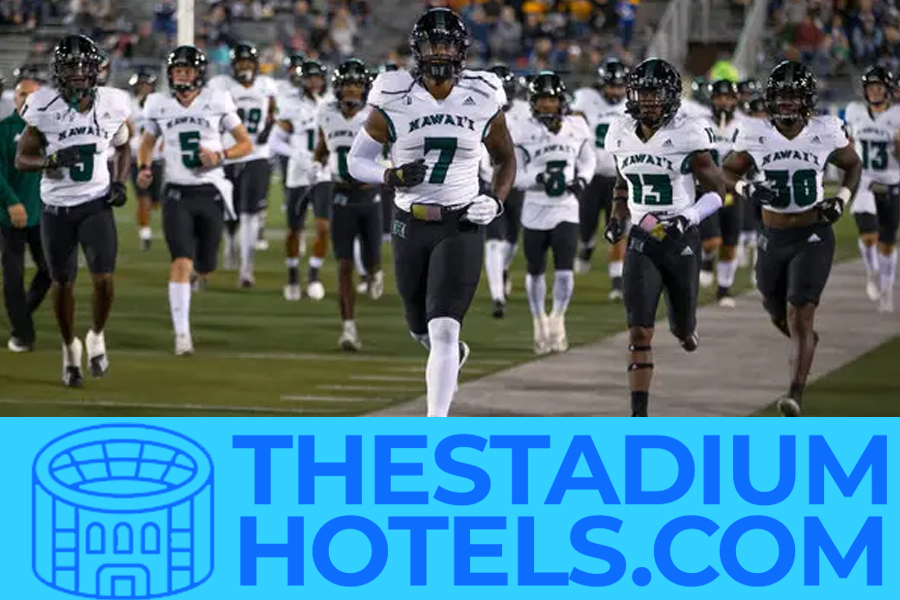 College football stadium at night during a bowl game