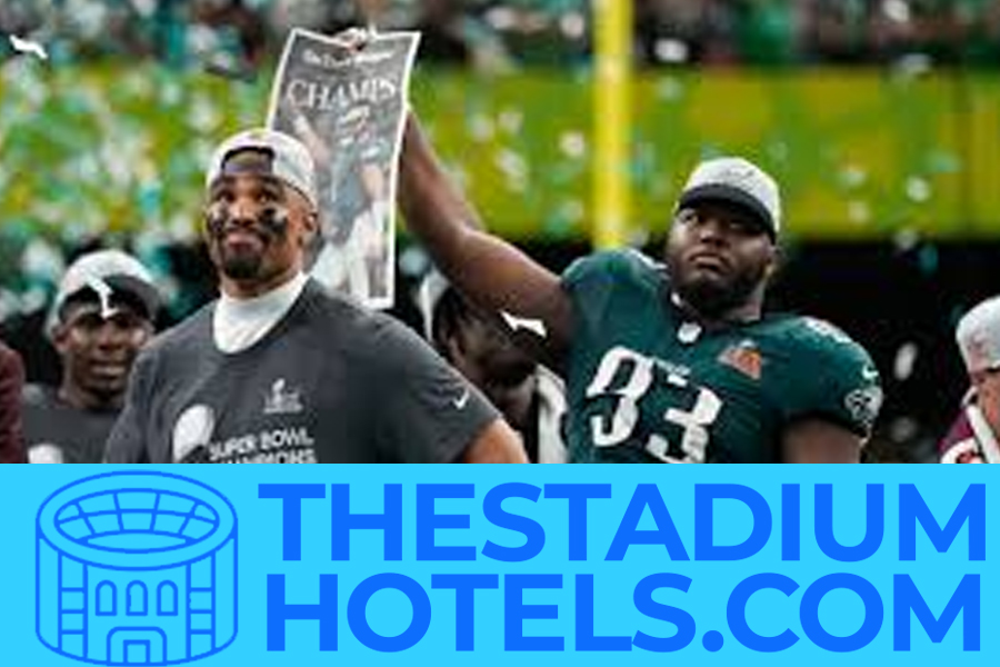 Night aerial view of the Super Bowl stadium and surrounding city